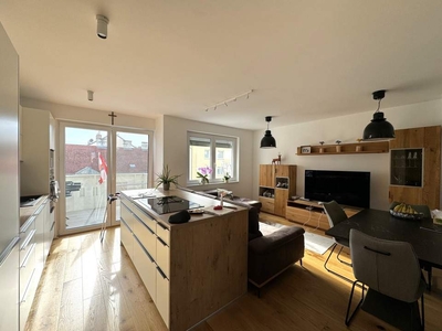 Top Neubauwohnung mit sonnigem Süd-Balkon und eigenem Garagenplatz!