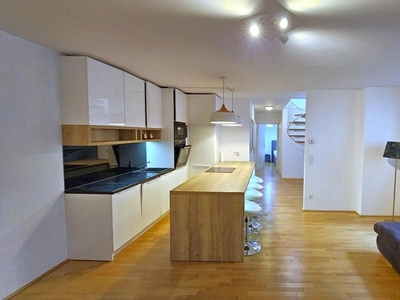 Zentrale 2 Zimmer Wohnung im Neubau mit eigenem Garten & Dachterrasse