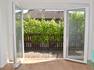 Lichtdurchflutete, großzügige Balkonwohnung mit Gartennutzung