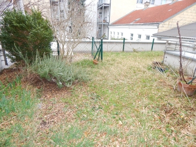 Traumhafte Gartenwohnung mit Terrasse in zentraler Lage und Tiefgaragenplatz