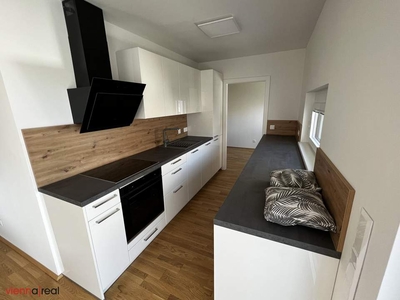 ERSTBEZUG mit FREIFLÄCHE und 1 TIEFGARAGENPLATZ - neue 3-Zimmer Wohnung mit großem Balkon, neuer Küche und Lift - Neubau aus 2023