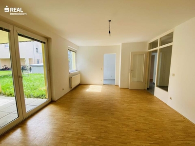 Traumhaftes Wohnen am Wallersee - EG-Wohnung mit Garten, Terrasse und Garage!