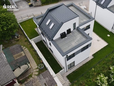 Neubau -Wohnung mit Dachterrasse und Garten