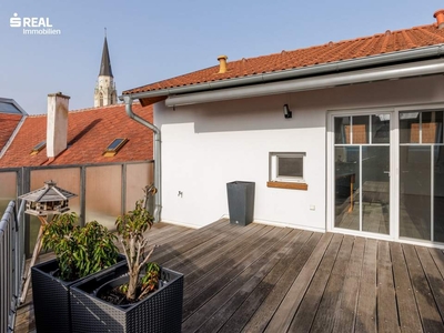 Exklusive zentrumsnahe Dachgeschoßwohnung mit großer Terrasse in absoluter Ruhelage