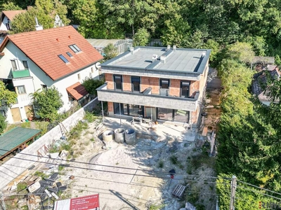 Neubau-Doppelhaus mit riesigem Garten und eigenem Waldstück | 4 Zimmer | Südseitiger Garten/Terrasse | Vollunterkellert | Luftwärmepumpe | Carport | 2 Einheiten verfügbar