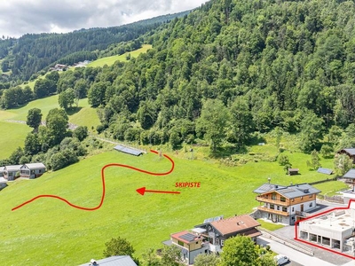 Grundstück an der Skipiste mit Baugenehmigung für ein Luxuschalet