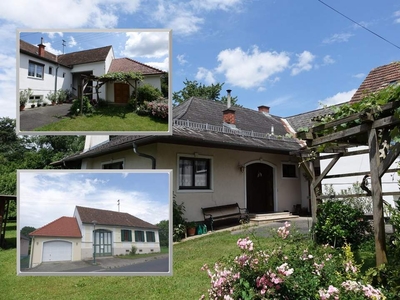 2 Häuser, idyllischer Garten mit Quelle, Brunnen, schöner Innenhof und Garage!