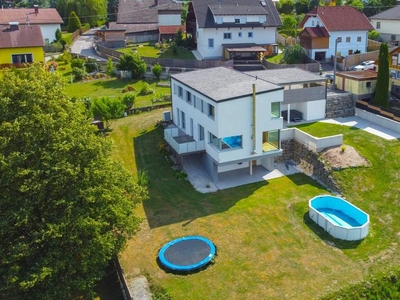 Nachhaltigkeit trifft Moderne – hochwertiges Einfamilienhaus mit einzigartigem Panoramablick in TOP Lage!