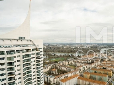 Attraktive Dreizimmer-Wohnung mit großzügiger Freifläche und Ausblick an der Neuen Donau