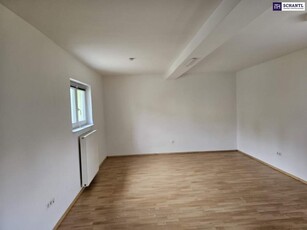 Charmante Anlegerwohnung mit zugeteilten Garten und Carport!