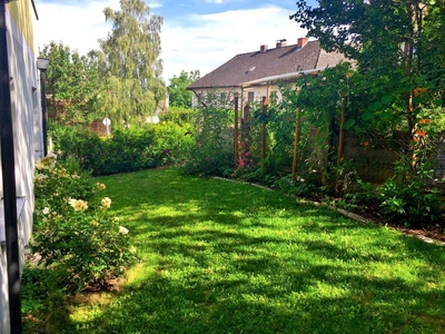 Wohnung mit 90 m² großen Garten