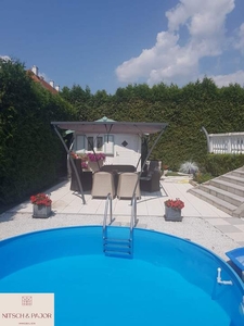 Traumhaftes Wohnen in Traiskirchen - Gemütliches Einfamilienhaus mit liebevollem uneinsehbaren Garten, Terrasse, Pool, Photovoltaik, Luftwärmepumpe und modernen Extras!